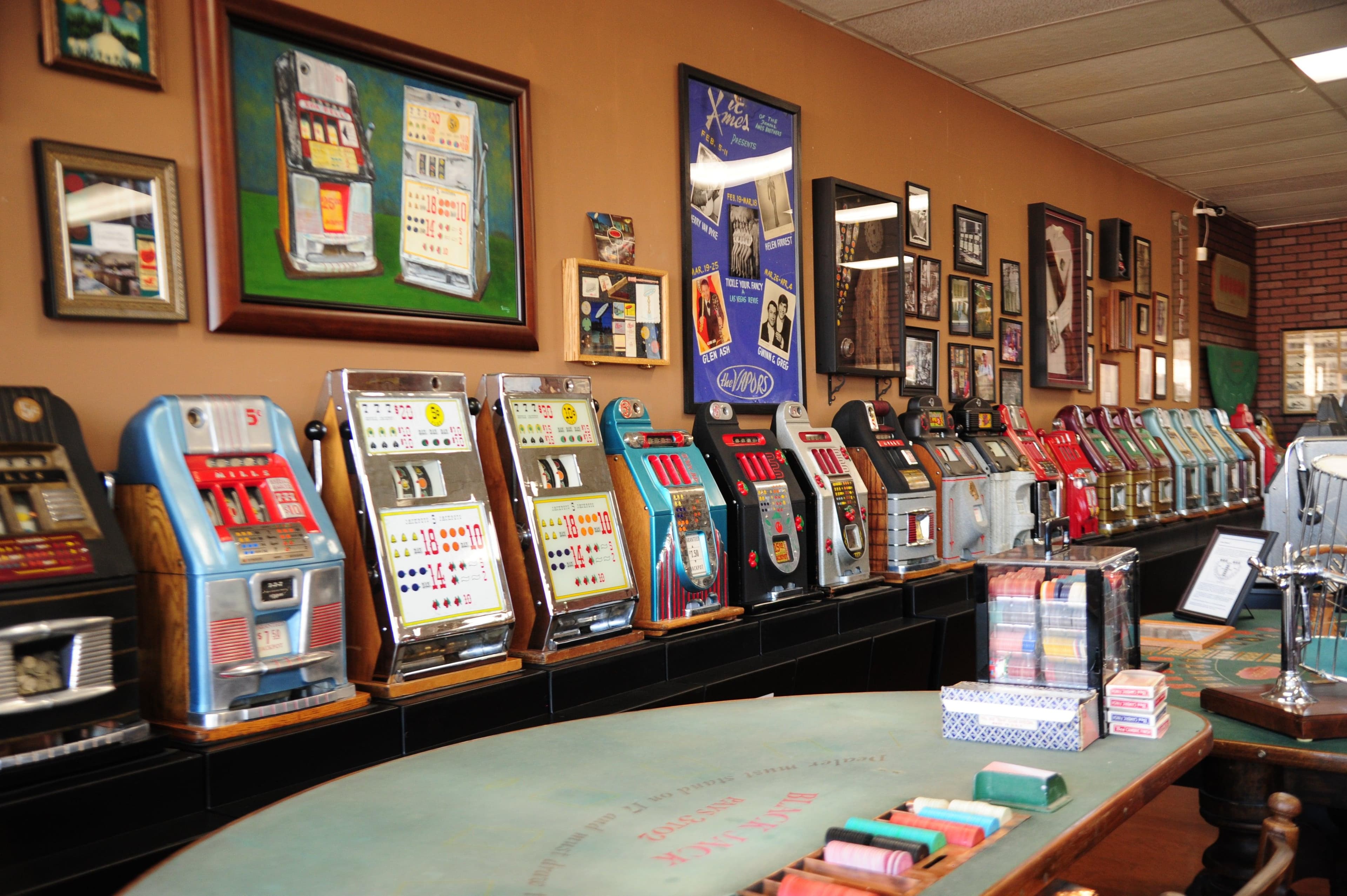 Vintage slot machines and gaming tables inside the History of Hot Springs Gambling Museum